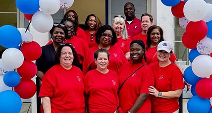 A celebrating group in red A celebrating group in red